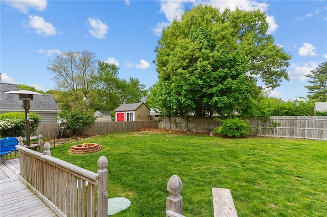 95 George Arden Ave, Warwick, RI 02886 - view of yard featuring an outdoor fire pit and a wooden deck