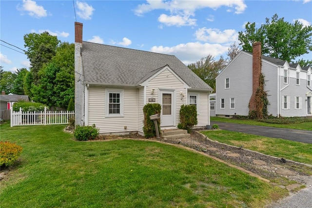 95 George Arden Ave, Warwick, RI 02886 - view of front of house with a chimney and a shingled roof