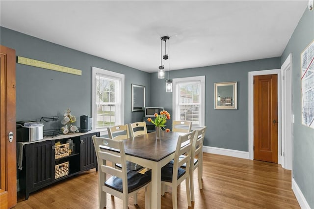95 George Arden Ave, Warwick, RI 02886 - dining space with light wood-type flooring and baseboards