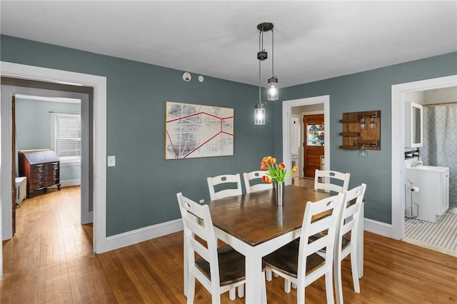 95 George Arden Ave, Warwick, RI 02886 - dining space with wood-type flooring and baseboards