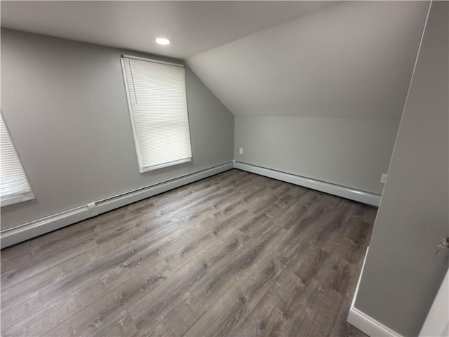 103 Pleasent St, Woonsocket, RI 02895 - bonus room with vaulted ceiling, wood finished floors, baseboards, a baseboard radiator, and recessed lighting