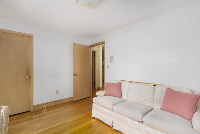 20 Loxley Rd, Providence, RI 02908 - living room featuring light wood-type flooring and baseboards