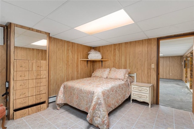20 Loxley Rd, Providence, RI 02908 - bedroom with a paneled ceiling, a baseboard heating unit, and wood walls