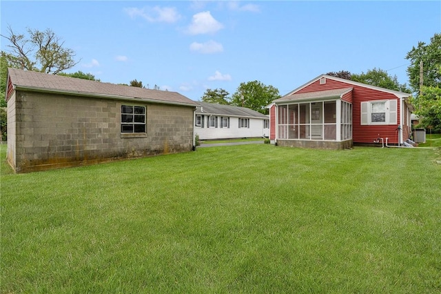 20 Loxley Rd, Providence, RI 02908 - view of grassy yard featuring a sunroom
