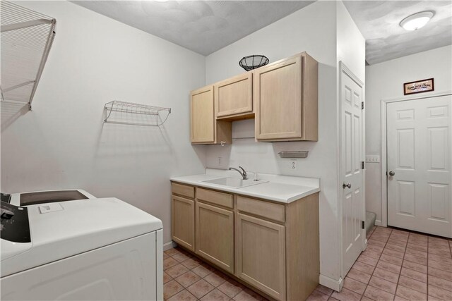32 Trolley Ln, Westerly, RI 02891 - laundry room featuring cabinet space, light tile patterned flooring, independent washer and dryer, and baseboards