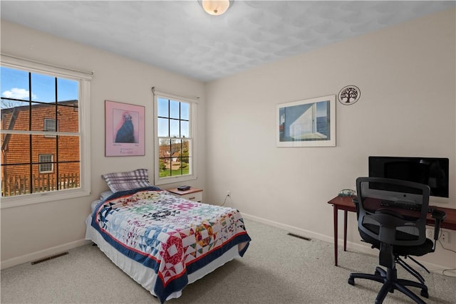 32 Trolley Ln, Westerly, RI 02891 - bedroom with baseboards, an office area, and carpet