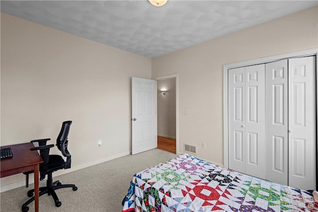 32 Trolley Ln, Westerly, RI 02891 - carpeted bedroom featuring a closet, baseboards, and a desk