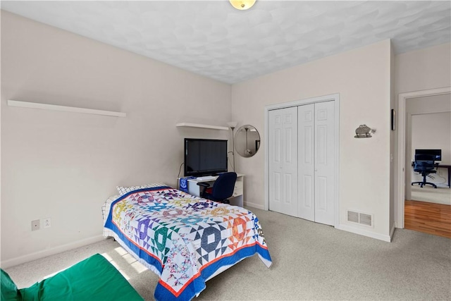 32 Trolley Ln, Westerly, RI 02891 - carpeted bedroom with baseboards and a closet