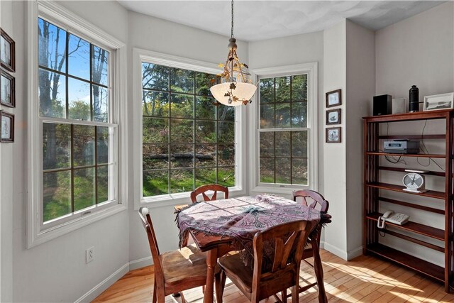 32 Trolley Ln, Westerly, RI 02891 - dining area featuring light wood-style flooring and baseboards