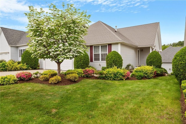 5 Enzo Dr, Coventry, RI 02816 - view of property exterior with concrete driveway, a yard, a shingled roof, and a garage