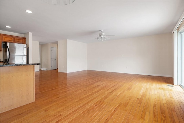5 Enzo Dr, Coventry, RI 02816 - unfurnished living room featuring light wood-style flooring, a ceiling fan, baseboards, and recessed lighting