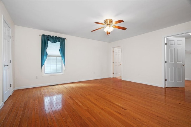 5 Enzo Dr, Coventry, RI 02816 - spare room with light wood-style floors, ceiling fan, and baseboards