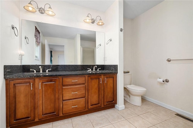 5 Enzo Dr, Coventry, RI 02816 - full bath featuring tile patterned floors, double vanity, toilet, and baseboards