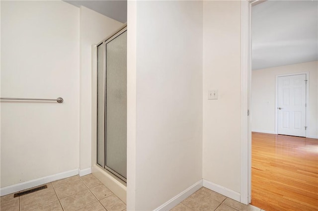 5 Enzo Dr, Coventry, RI 02816 - full bathroom featuring tile patterned flooring, a stall shower, and baseboards