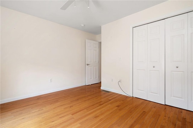 5 Enzo Dr, Coventry, RI 02816 - unfurnished bedroom with light wood finished floors, a closet, baseboards, and a ceiling fan