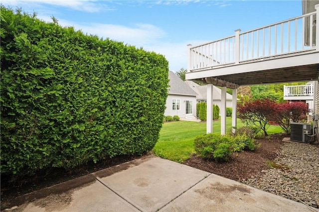 5 Enzo Dr, Coventry, RI 02816 - view of green lawn with central air condition unit and a patio area