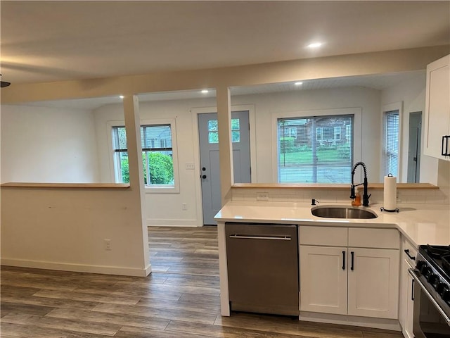 111 Samuel Gorton Ave, Warwick, RI 02889 - kitchen featuring a sink, appliances with stainless steel finishes, plenty of natural light, dark wood-type flooring, and recessed lighting