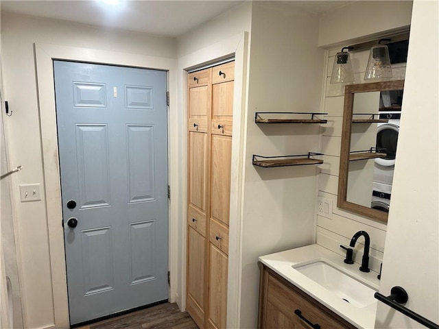 111 Samuel Gorton Ave, Warwick, RI 02889 - laundry area with a sink and dark wood-type flooring