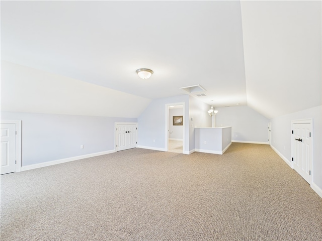 147 Southwinds Dr, South Kingstown, RI 02879 - bonus room featuring lofted ceiling, carpet floors, and baseboards