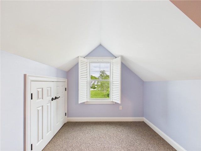147 Southwinds Dr, South Kingstown, RI 02879 - bonus room with carpet flooring, lofted ceiling, and baseboards