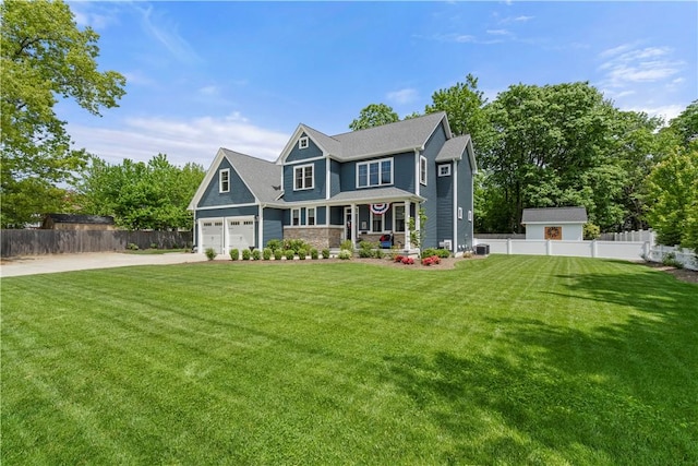 360 Pleasant St, East Providence, RI 02916 - view of front facade featuring covered porch and driveway