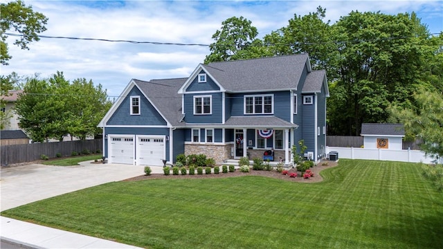 360 Pleasant St, East Providence, RI 02916 - view of front facade featuring a porch, concrete driveway, central AC unit, stone siding, and an attached garage