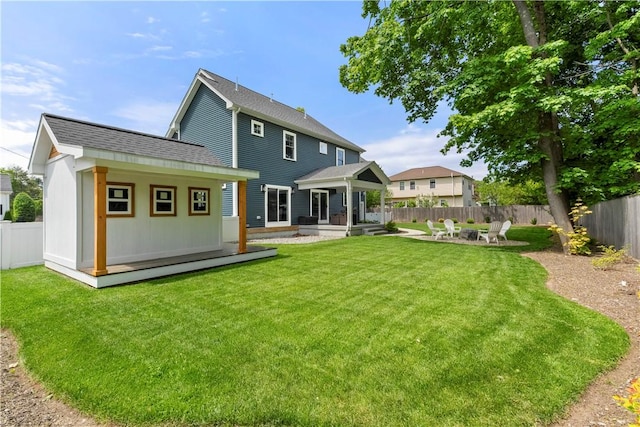 360 Pleasant St, East Providence, RI 02916 - back of property with a shingled roof