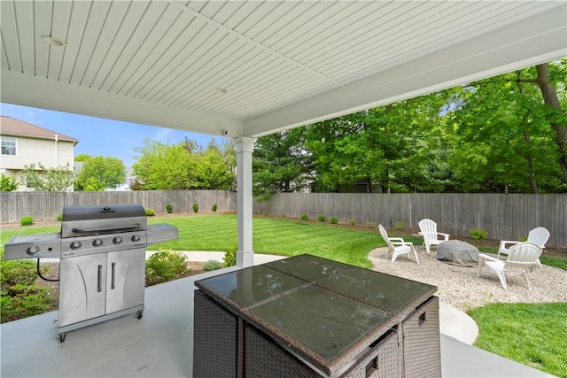 360 Pleasant St, East Providence, RI 02916 - view of patio with area for grilling and an outdoor fire pit