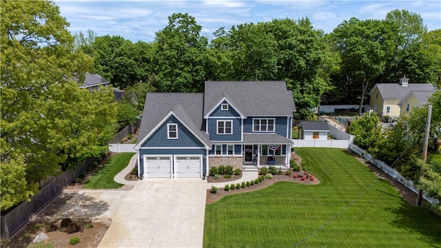 360 Pleasant St, East Providence, RI 02916 - view of front of property featuring covered porch, driveway, and stone siding