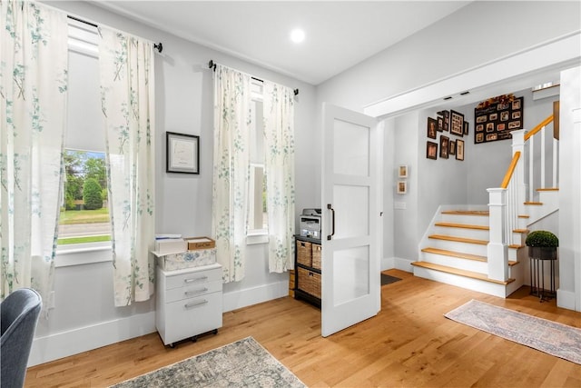 360 Pleasant St, East Providence, RI 02916 - foyer entrance with stairway, wood finished floors, baseboards, and recessed lighting