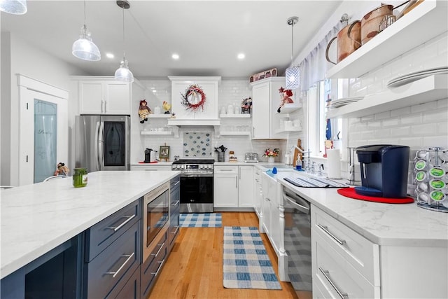 360 Pleasant St, East Providence, RI 02916 - kitchen with open shelves, appliances with stainless steel finishes, backsplash, white cabinets, and recessed lighting