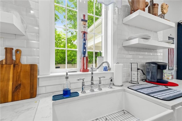 360 Pleasant St, East Providence, RI 02916 - kitchen featuring open shelves, a sink, plenty of natural light, and light countertops