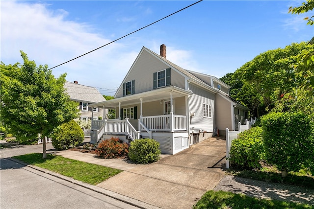 30 First School St, Bristol, RI 02809 - view of front facade featuring a porch, a chimney, and stairs