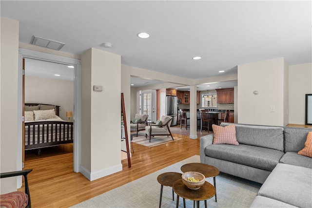 30 First School St, Bristol, RI 02809 - living room featuring light wood-type flooring and recessed lighting