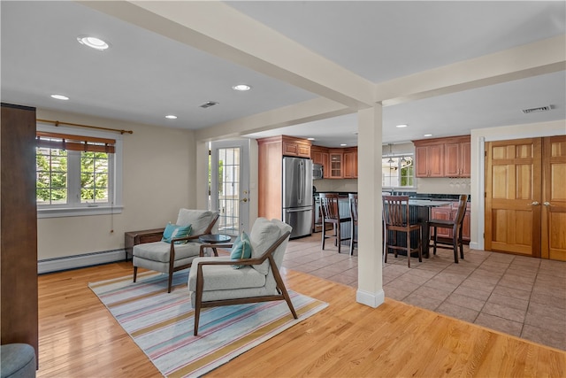 30 First School St, Bristol, RI 02809 - living area featuring baseboard heating, recessed lighting, and light wood-style floors