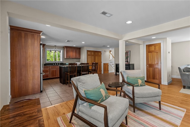 30 First School St, Bristol, RI 02809 - living room featuring stairway, recessed lighting, baseboards, and light wood-type flooring