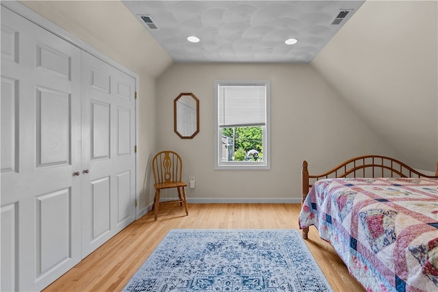 30 First School St, Bristol, RI 02809 - bedroom with lofted ceiling, wood finished floors, and baseboards