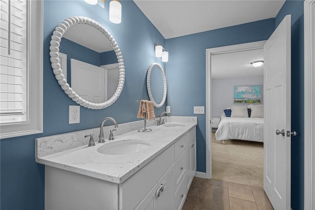 4 Overlook Cir, Coventry, RI 02816 - ensuite bathroom featuring double vanity and baseboards