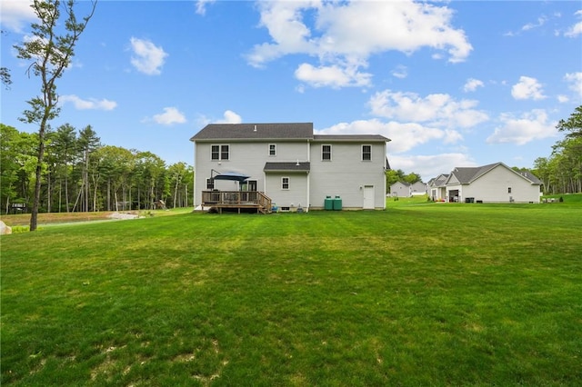 4 Overlook Cir, Coventry, RI 02816 - rear view of property featuring a deck, a lawn, and central AC unit