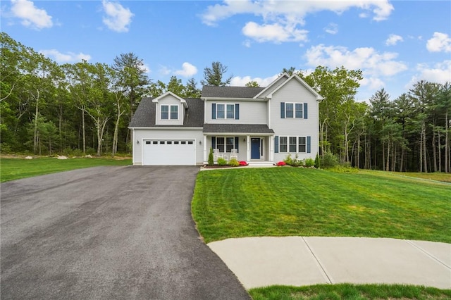 4 Overlook Cir, Coventry, RI 02816 - traditional home featuring asphalt driveway, a porch, a front lawn, and an attached garage