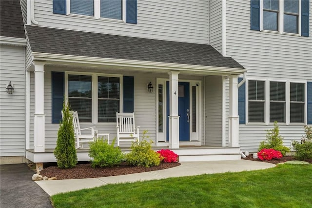 4 Overlook Cir, Coventry, RI 02816 - doorway to property featuring covered porch and a shingled roof