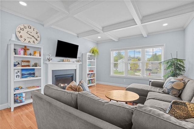 4 Overlook Cir, Coventry, RI 02816 - living area with baseboards, a glass covered fireplace, light wood-style floors, beam ceiling, and coffered ceiling