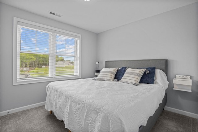 4 Overlook Cir, Coventry, RI 02816 - carpeted bedroom featuring baseboards and multiple windows