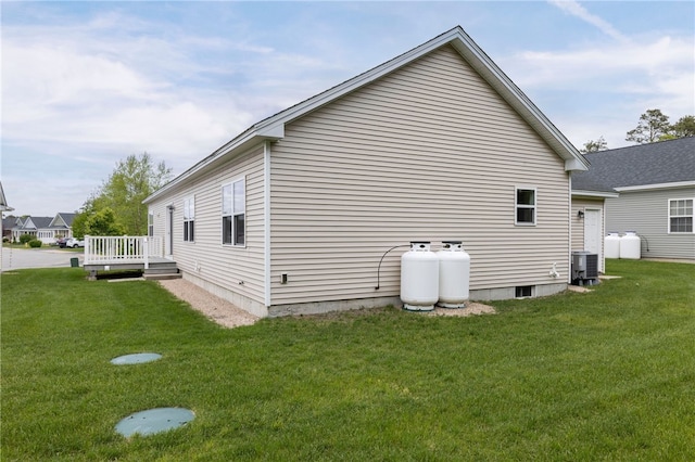 109 Chickadee Ln Unit A24, South Kingstown, RI 02879 - view of home's exterior with a lawn, cooling unit, and a deck