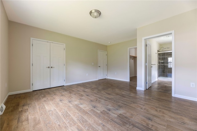 109 Chickadee Ln Unit A24, South Kingstown, RI 02879 - unfurnished bedroom with wood finished floors, baseboards, and a closet