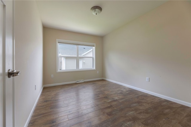 109 Chickadee Ln Unit A24, South Kingstown, RI 02879 - spare room featuring dark wood finished floors and baseboards