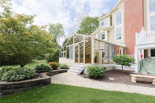 51 Reservoir Rd, Cumberland, RI 02864 - view of yard featuring a sunroom