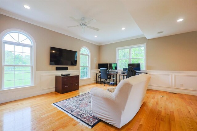 51 Reservoir Rd, Cumberland, RI 02864 - living area with crown molding, a desk, light wood finished floors, ceiling fan, and a wainscoted wall