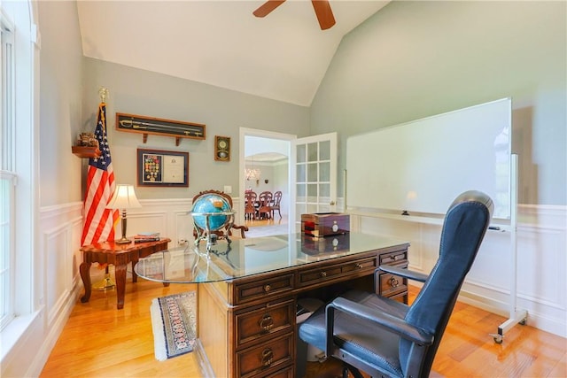 51 Reservoir Rd, Cumberland, RI 02864 - home office with vaulted ceiling, a decorative wall, light wood-type flooring, a ceiling fan, and wainscoting