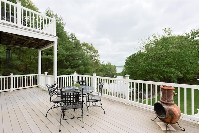 51 Reservoir Rd, Cumberland, RI 02864 - wooden deck featuring outdoor dining space and a water view